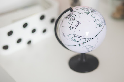 Image of a globe on a table.