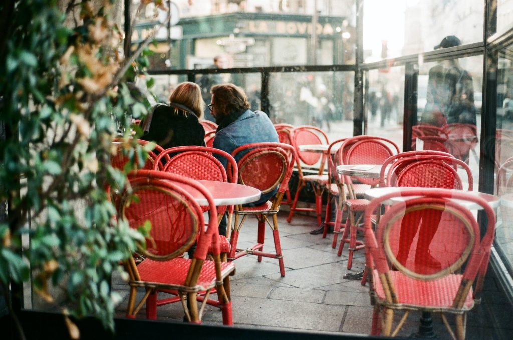 Couple sitting in Parisian café
