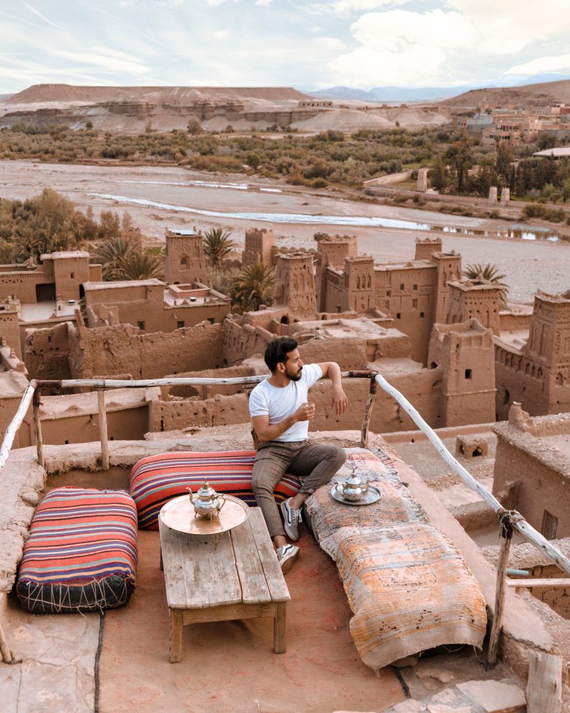 Man Sitting on Top of the Building While Looking the Overview in Morocco.