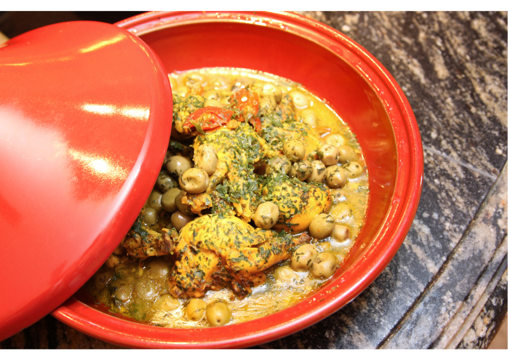 Tajine with chicken, olives,, and tomatoes.