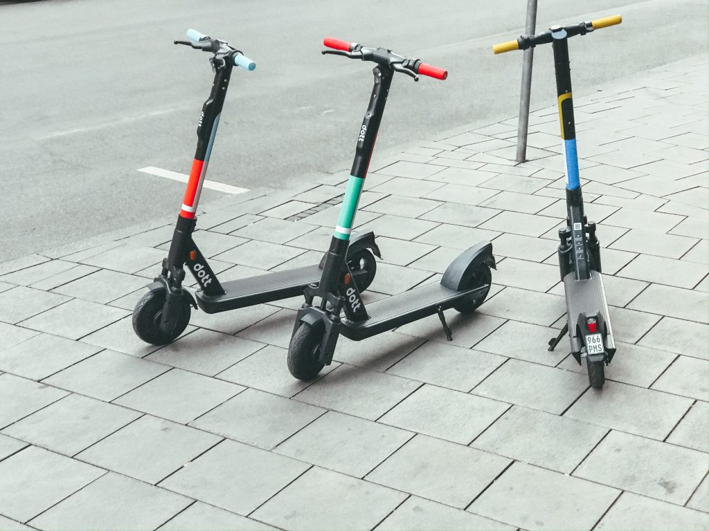 Electric scooters on sidewalk