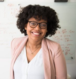 Woman Standing Near Whiteboard