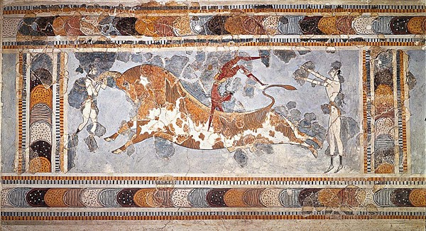 Painting of a brown and white bull jumping towards a human while another stands behind and a third clings to its back with legs in the air