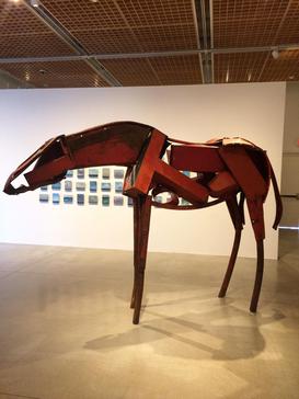 Shape of a horse made of connected pieces of metal