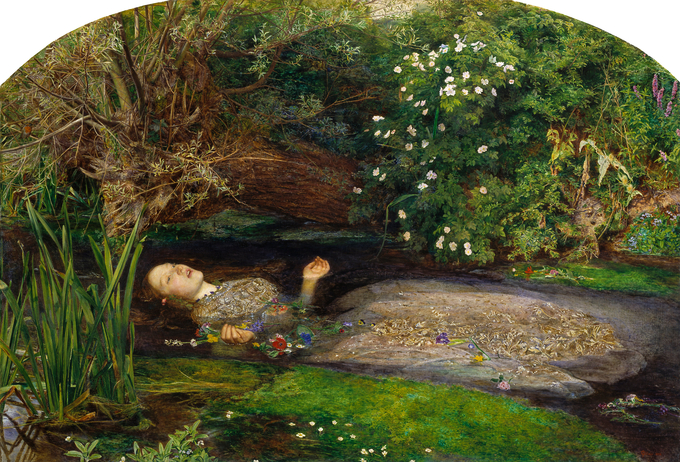 Woman floating with flowers in a creek in the midst of bushes on shore