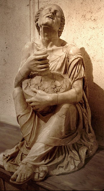 Seated stone woman clutching a large vase and looking up