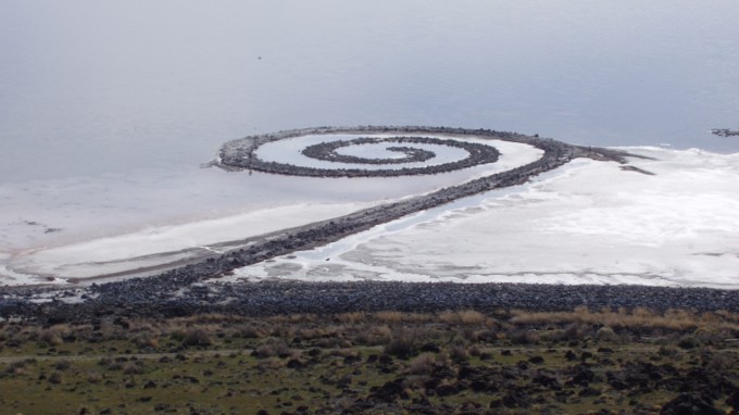 A rock jetty shaped like a swirl off shore