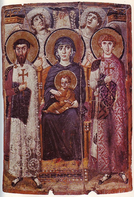 Woman with a baby seated in the midst of priests all in robes
