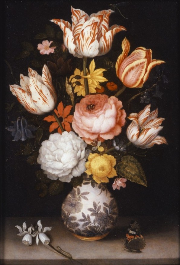 Vase with pink, white, yellow, red, and blue flowers