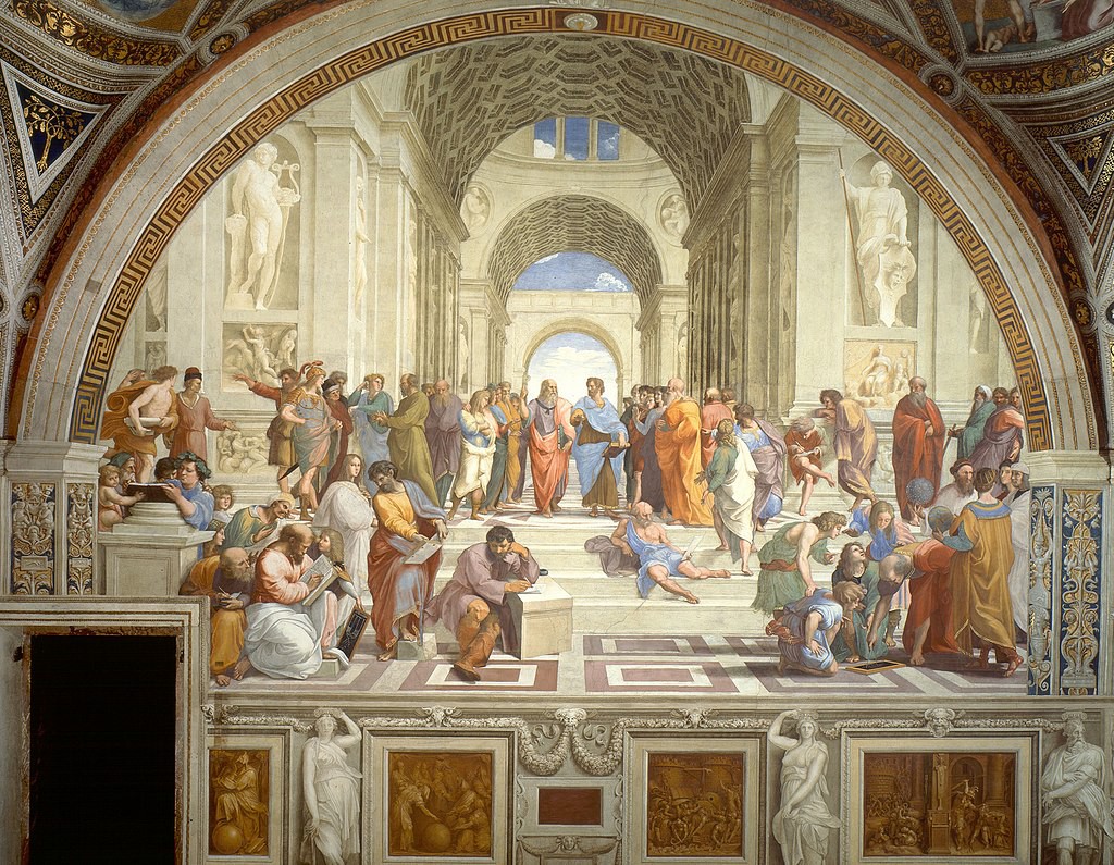 Crowds of men studying and talking on a platform in a large arched building