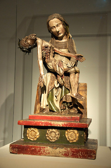 Wood carving of Virgin Mary holding dead Jesus