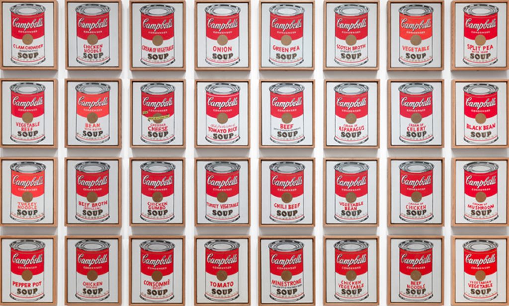 Rows of cans of different kinds of Campbell's Soup