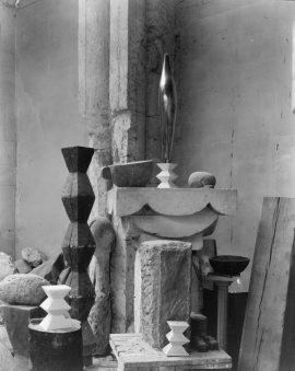 Collection of stone shapes and tables in a studio