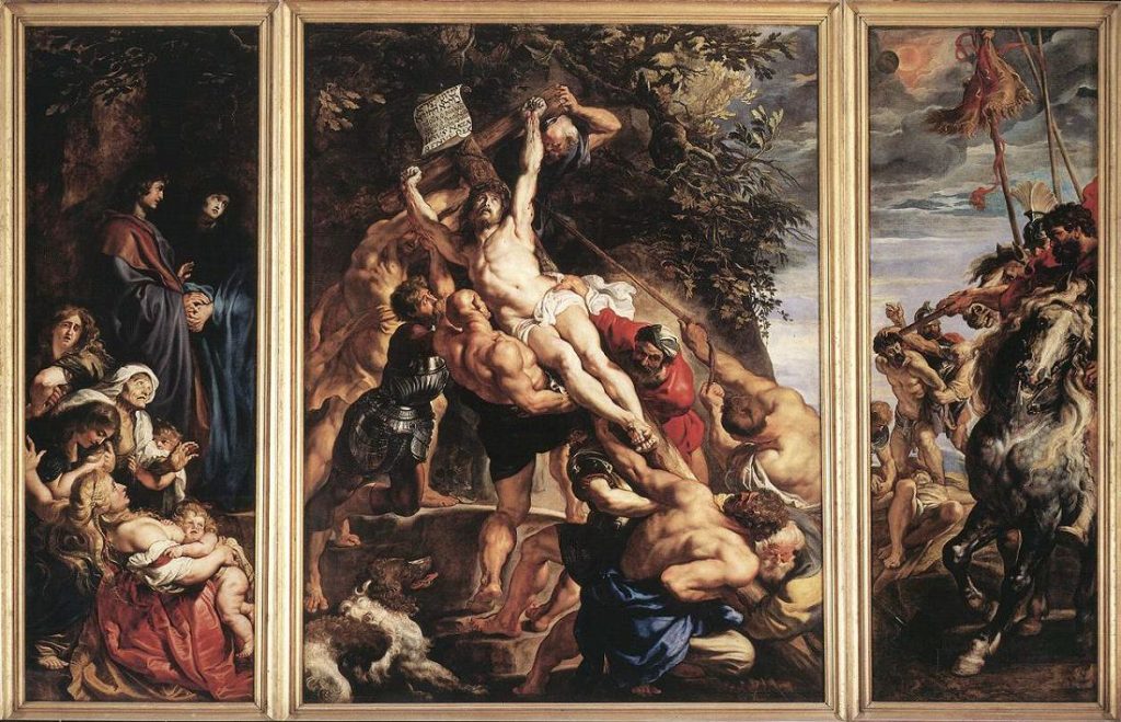 Men putting up a cross with a man on it while women and men watch in horror