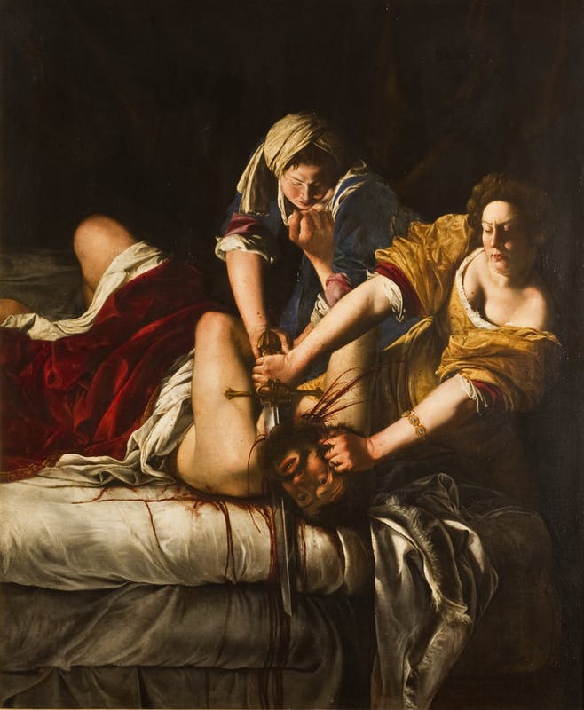 Two women holding down a man while one cuts off his head with a sword