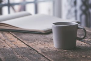 Coffee cup and Notebook