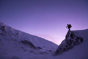 Snowy Sunrise Mountain Climbing