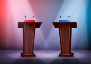 Photo of two wooden podiums, one bathed in blue light and one in red light.