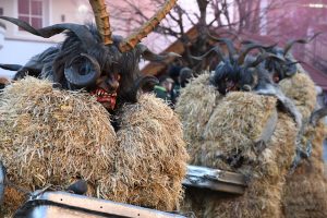 Photo of men dressed-up as Krampus.